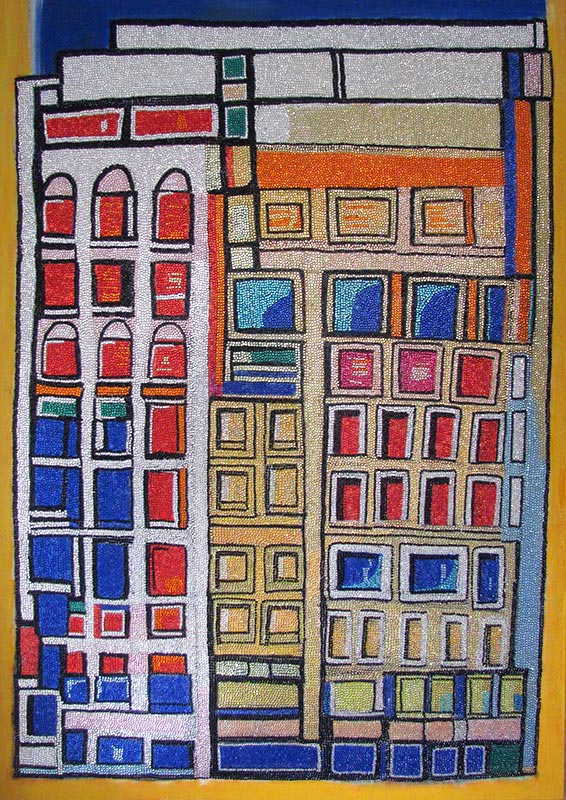 Ein abstraktes, farbenfrohes Gemälde mit geometrischen Formen und lebendigen Farben (u.a. Rot, Blau, Gelb) dominiert das Bild. Kunstwerk 