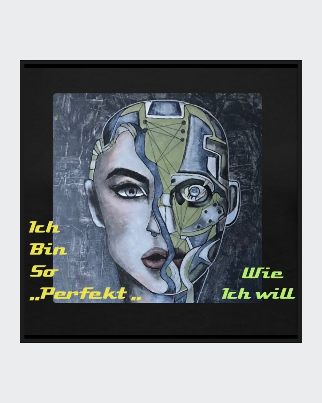 Ein schwarzes Langarmshirt mit einem Kunstwerk auf der Vorderseite. Das Motiv zeigt ein stilisiertes Gesicht, halb menschlich, halb futuristisch, mit der gelb-grünen Botschaft „Ich bin so 'PERFEKT' wie ich will“.