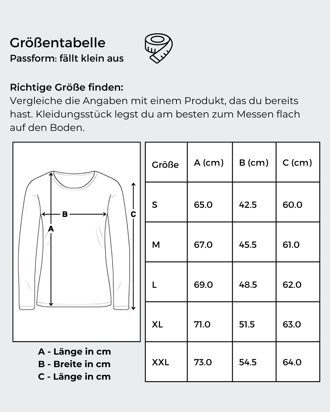 Größentabelle von: Ein schwarzes Langarmshirt mit einem Kunstwerk auf der Vorderseite. Das Motiv zeigt ein stilisiertes Gesicht, halb menschlich, halb futuristisch, mit der gelb-grünen Botschaft „Ich bin so 'PERFEKT' wie ich will“. 