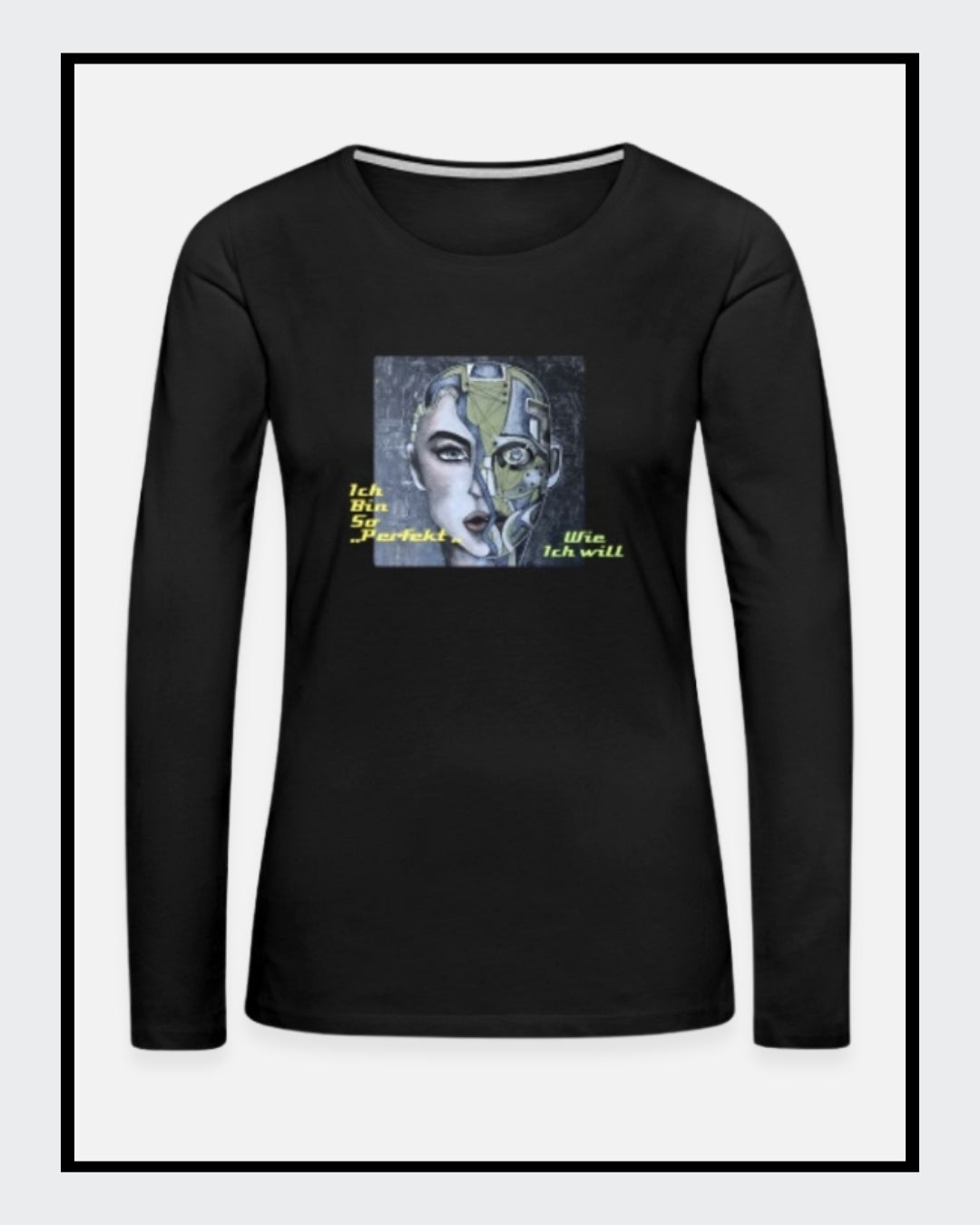 Ein schwarzes Langarmshirt mit einem Kunstwerk auf der Vorderseite. Das Motiv zeigt ein stilisiertes Gesicht, halb menschlich, halb futuristisch, mit der gelb-grünen Botschaft „Ich bin so 'PERFEKT' wie ich will“. 